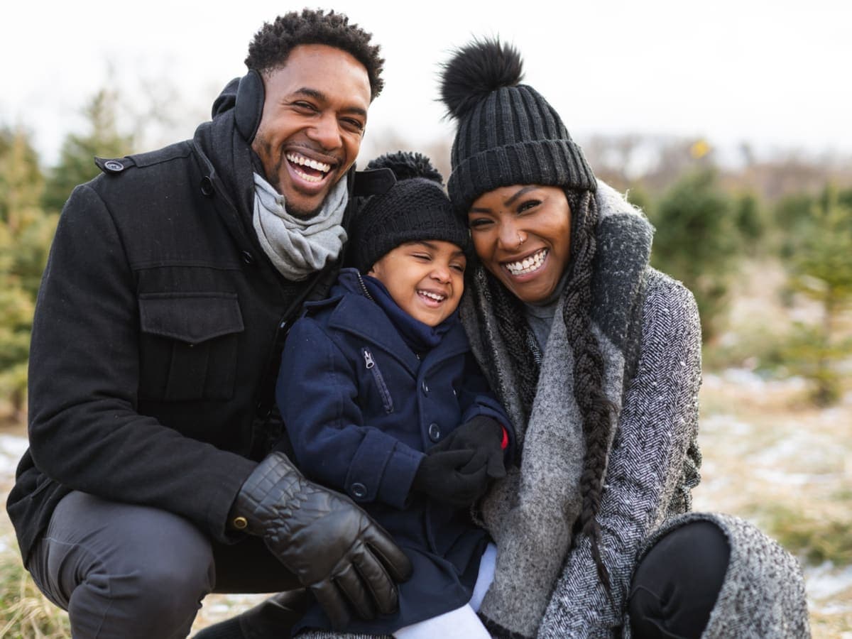Family happily smiling