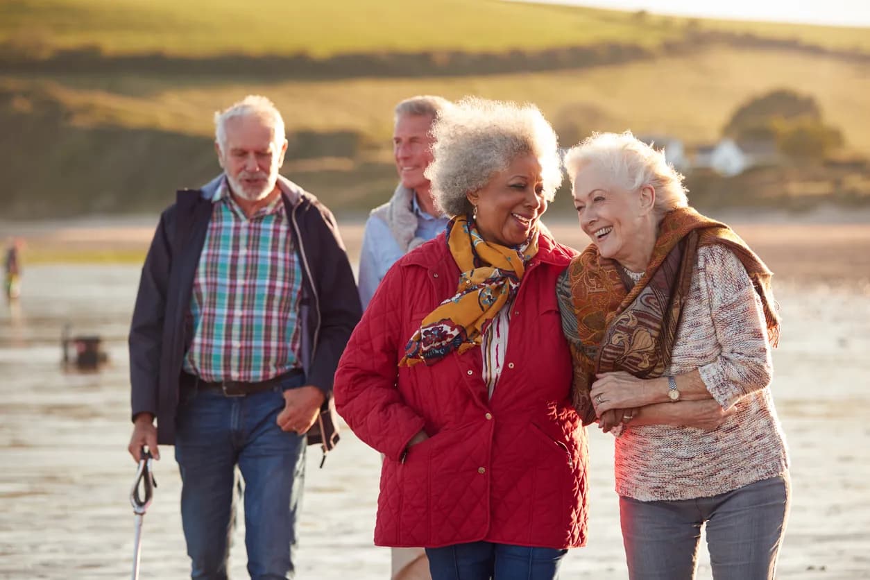 Four people walking outside